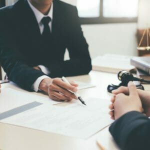 Law, advice and Legal services concept. Lawyer and attorney having team meeting at law firm.